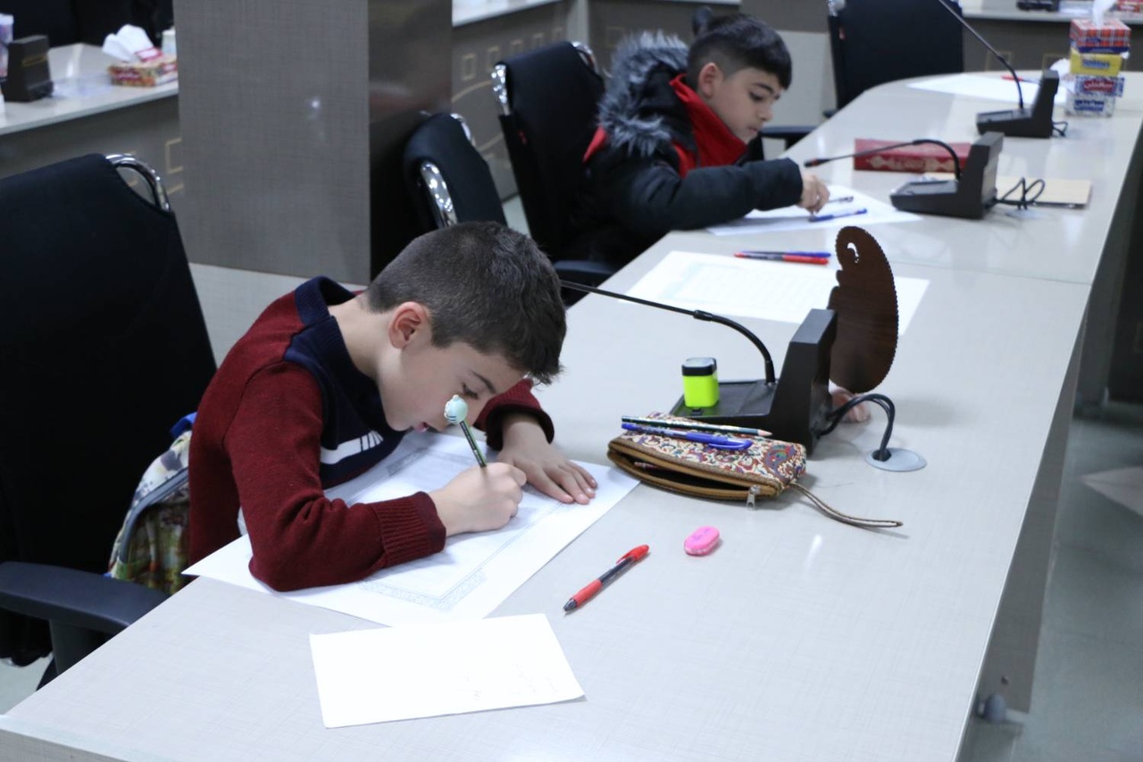 برگزاری طرح سراسری کتابت قرآن کریم به مناسبت هفته کتاب در شهرکرد