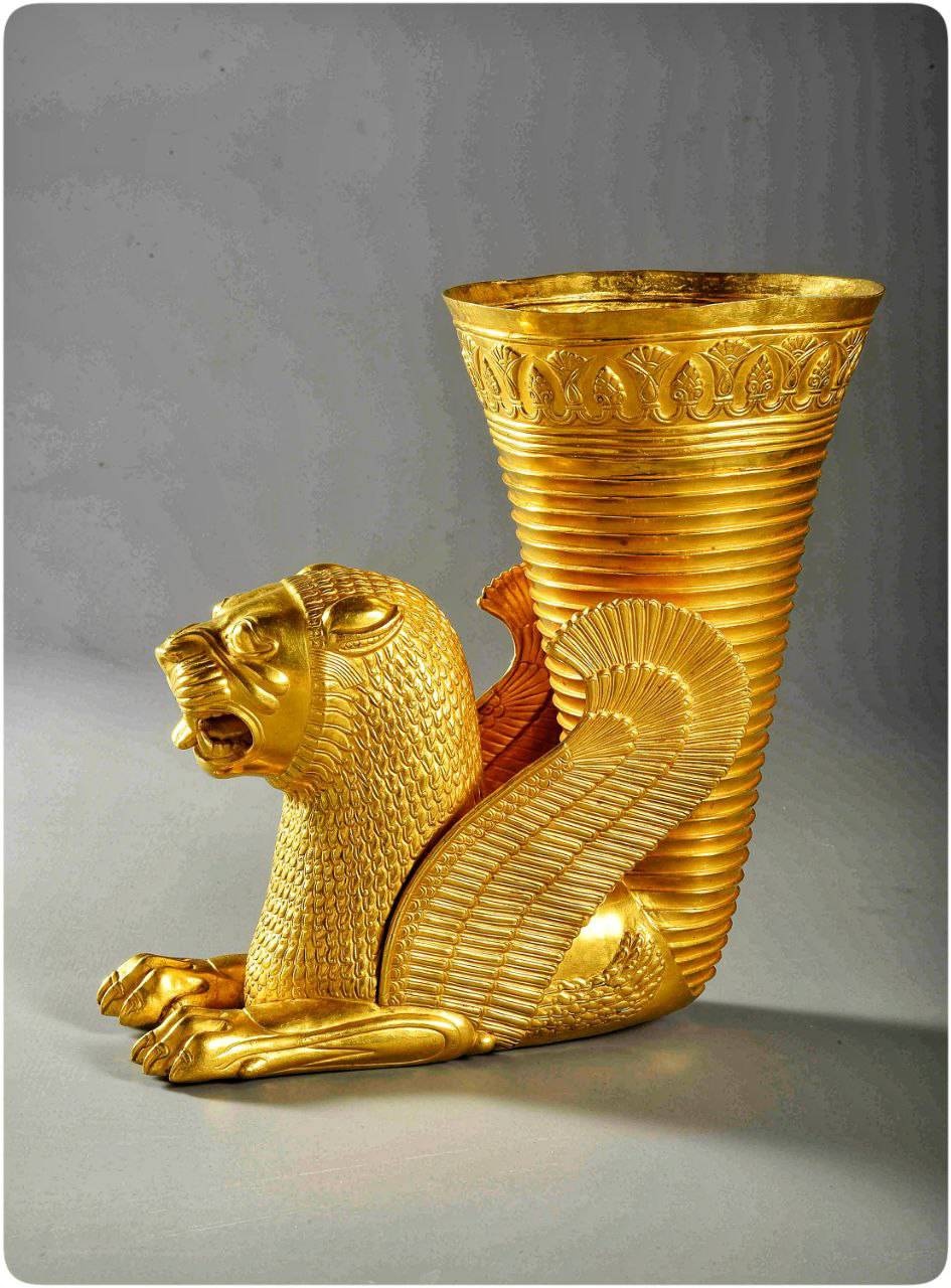 تکوک زرین با نیم‌تنه شیر