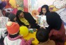 کتاب‌خوانی ویژه کودکان در غرفه کتابخانه آستان عبدالعظیم
